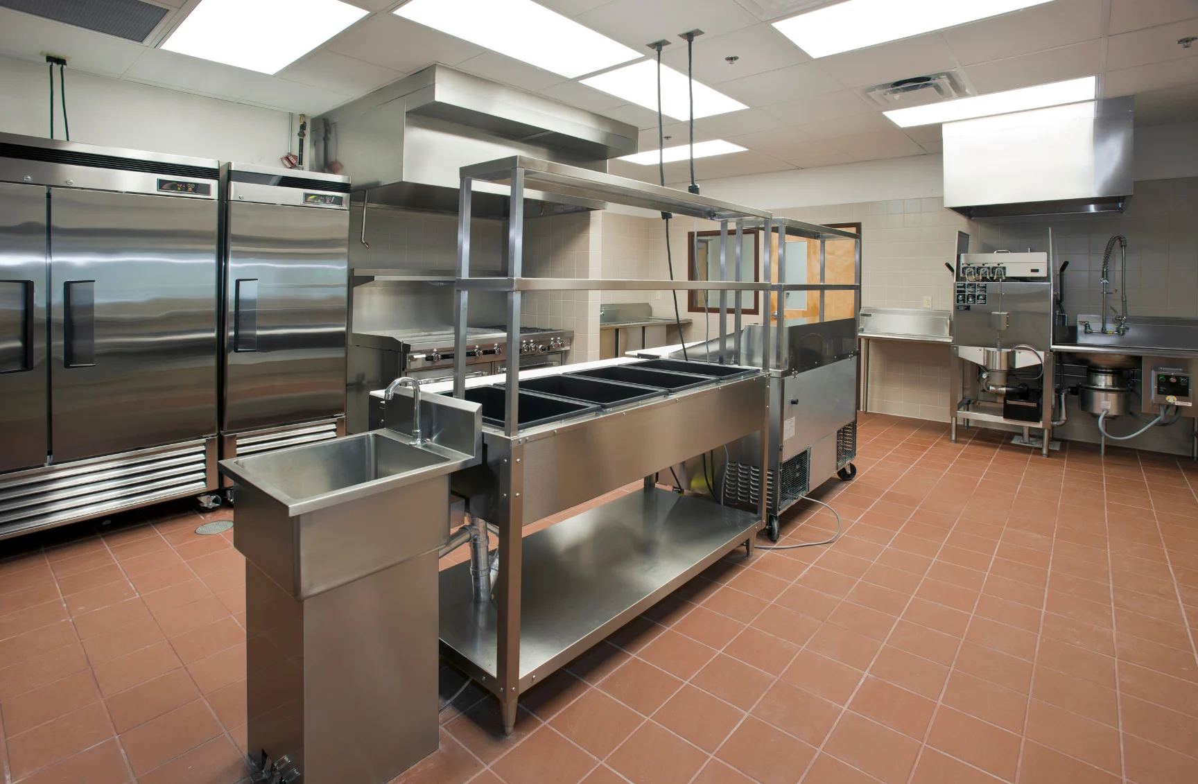 Commercial fridges in a working kitchen