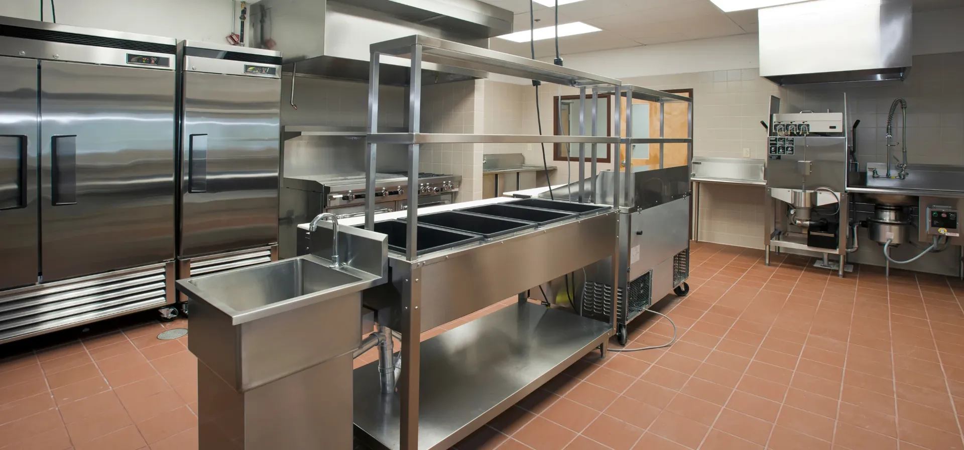 Upright refrigeration cabinets in a commercial kitchen